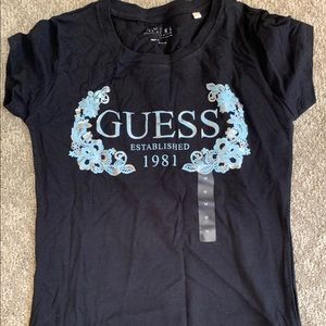 Never worn women’s medium Guess black tee.